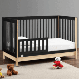 BabyGap Tate 4-in-1 convertible crib with bouclé upholstered panels in ebony/natural finish.