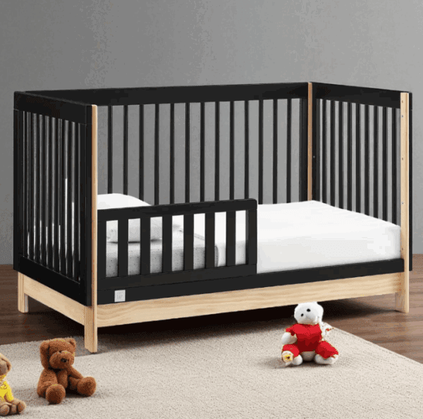 BabyGap Tate 4-in-1 convertible crib with bouclé upholstered panels in ebony/natural finish.