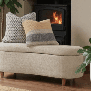 Solomon upholstered storage bench with walnut legs and hinged storage top.